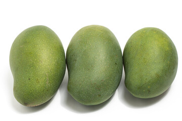 Three fresh organic green mango delicious fruit flat lay isolated on white background clipping path