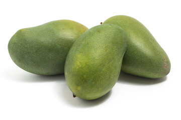 Three fresh organic green mango delicious fruit side view isolated on white background clipping path