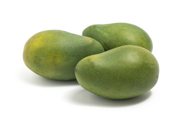 Three fresh organic green mango delicious fruit side view isolated on white background clipping path