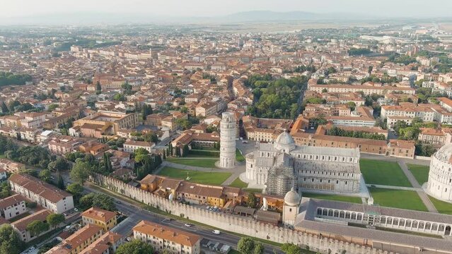 Pisa, Italy. Famous Leaning Tower and Pisa Cathedral in Piazza dei Miracoli. Summer. Morning hours, Aerial View, Point of interest