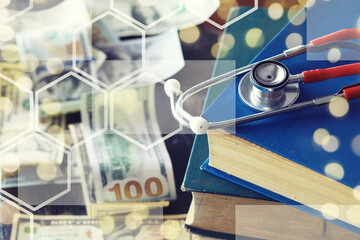 Close up red stethoscope on the US dollar banknote on wooden table. Health check or money and financial concept - obrazy, fototapety, plakaty