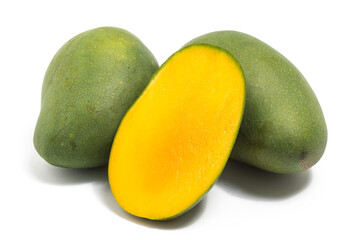 Half cut and two whole fresh organic green mango delicious fruit side view isolated on white background clipping path
