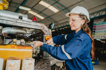 Smart, Confidence expertise and professional female engineer or mechanic is working, inspecting or...