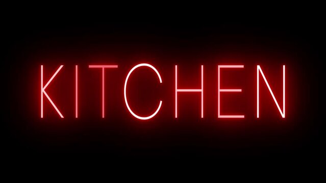 Flickering red retro style neon sign glowing against a black background for KITCHEN