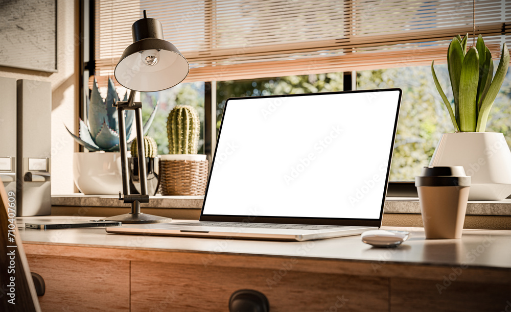 Poster a laptop with a blank screen sits on a stylish wooden desk within a loft-style interior, with green 