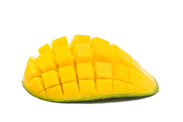 Cut into cubes fresh organic green mango delicious fruit side view isolated on white background clipping path