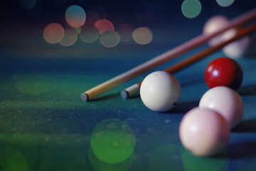Billiard balls and cue on pool table. Russian billiards. Close-up of items for the game. Background...