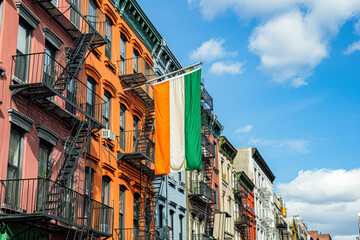 Fototapeta na wymiar Irish flag on the streets of the American city, integration of Irish traditions into American culture, March, concept graphic resources, generative ai