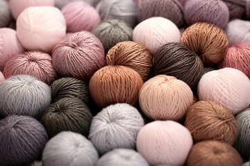 Close up of crocheted yarn and balls of yarn, in the style of soft, muted palette, soft tonal range, 20th century scandinavian style, soft variations of color, stylish, contrasting, soft-edged

