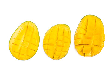 Three sliced cut into cubes fresh organic green mango delicious fruit flat lay isolated on white background clipping path