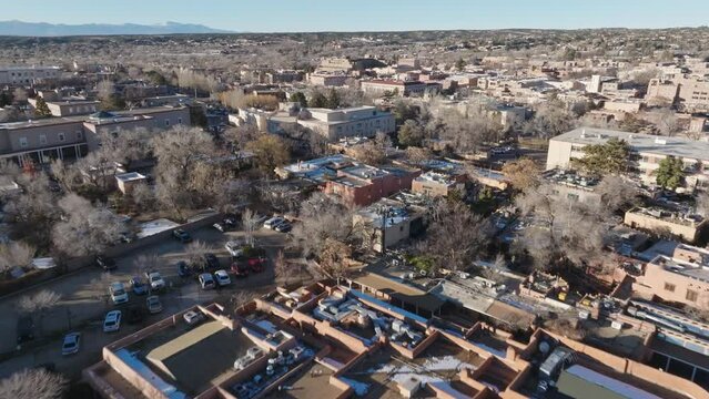 Downtown Santa Fe, New Mexico with drone video moving in.