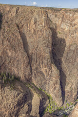 Deep vertical cuts in the walls of the south rim of the Black Canyon of the Gunnison seen from Big...