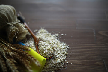 The concept of the cost of grain. 5000 ruble banknotes around a handful of ground grain. World hunger.