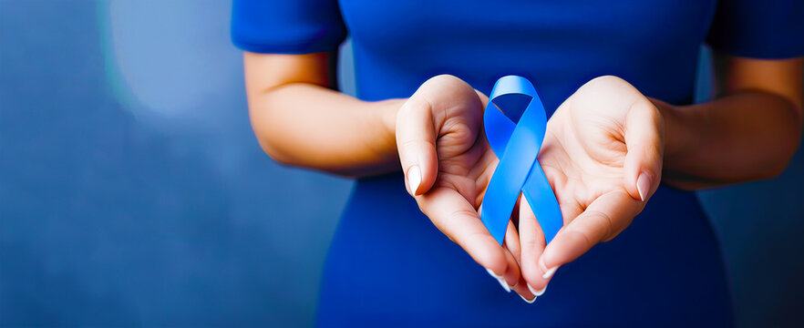 hand hold blue ribbon for world epilepsy day, Men's day, a Diabetes day.