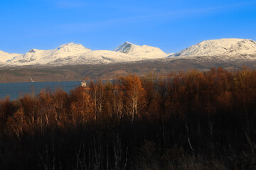 landscape with the sea and mountains in the background