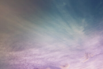 Beautiful sunset sky above clouds with dramatic light. Cabin view from airplane