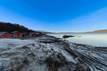 winter landscape with sea and mountains in Norway