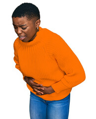 Young african american woman wearing casual clothes with hand on stomach because nausea, painful disease feeling unwell. ache concept.