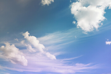 Beautiful sunset sky above clouds with dramatic light. Cabin view from airplane