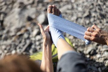 Personal View of First Aid bandage of a Solo Female Hiker in Nature Wilderness