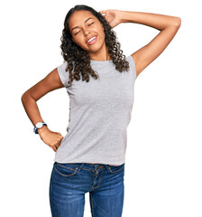 Young african american girl wearing casual clothes stretching back, tired and relaxed, sleepy and yawning for early morning