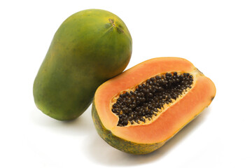 Half cut sliced and whole fresh organic papaya delicious fruit isolated on white background clipping path