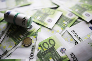 100 euro banknote pack and wood bankground. Currency, financial