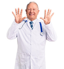 Senior handsome grey-haired man wearing doctor coat and stethoscope showing and pointing up with fingers number ten while smiling confident and happy.