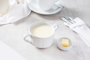 Fototapeta na wymiar Semolina porridge with butter, breakfast