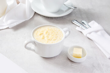 Fototapeta na wymiar Corn porridge with butter, breakfast