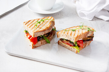 Two sandwiches with vegetables - eggplant, tomato, zucchini