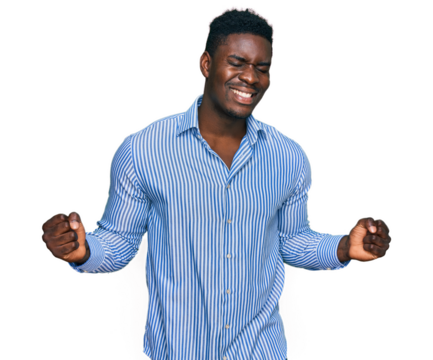 Handsome business black man wearing casual striped t shirt very happy and excited doing winner gesture with arms raised, smiling and screaming for success. celebration concept. - Powered by Adobe