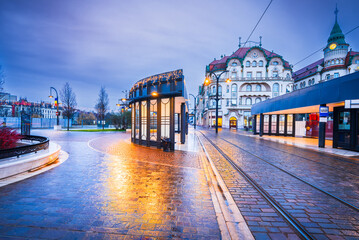 Oradea, Romania - Rainy twilight Union Square - travel in Transylvania. - Powered by Adobe