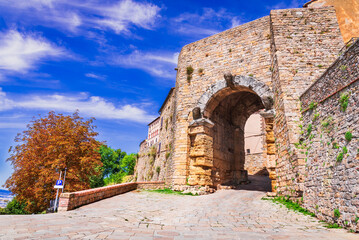 Volterra, Italy. Porta all'Arco,  ancient Tuscan town with old houses, towers and churches, Tuscany historical landscape.