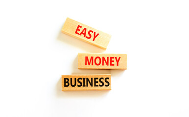 Easy money business symbol. Concept words Easy money business on beautiful wooden blocks. Beautiful white table white background. Easy money business concept. Copy space.