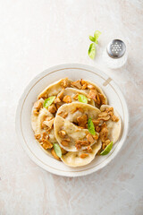 Homemade mushroom ravioli with basil