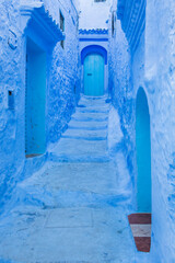 Naklejka premium Beautiful and colorful architecture and street of Chefchaouen, Morocco