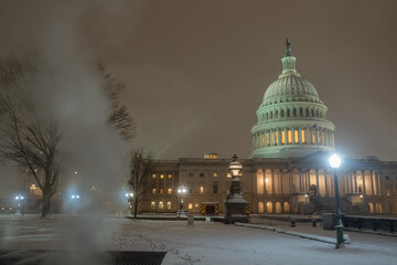 Capitol building in snow. Winter Capitol hill, Washington DC. Capitols dome in winter night snow. After the Snow Washington DC. United States capitol building in the snow.