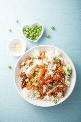 Rice bowl with carrot and pea