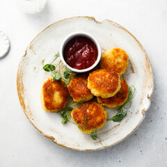 Homemade chicken cakes with sauce