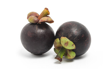 Two fresh organic mangosteen delicious fruit side view isolated on white background clipping path