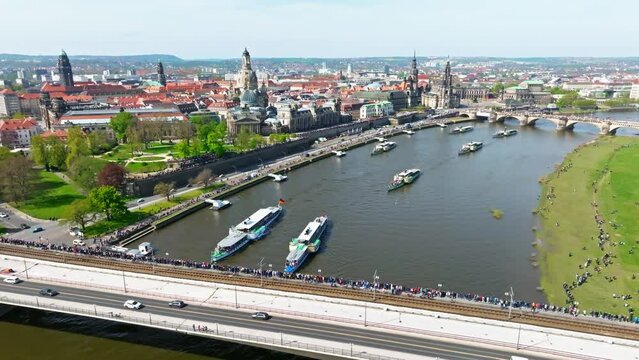 Drone video from the steamboat parade in Dresden. Drone move backwards