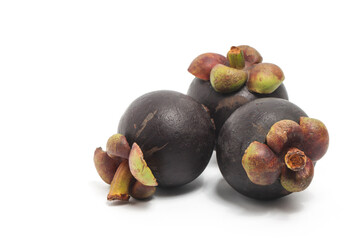 Three fresh organic mangosteen delicious fruit isolated on white background clipping path