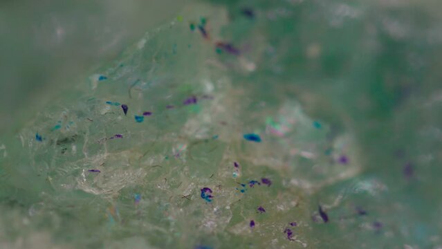 Natural crystal amazonite stone texture rotating abstract background