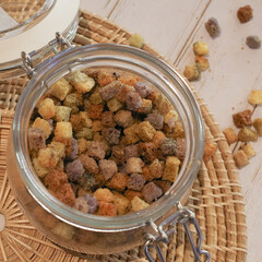 Small square dried whole wheat bread for salad bar.
