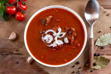 Goulash or Gulasch is a soup or stew of meat and vegetables seasoned with paprika and other spices. Perfect for recipe, article, menu book, or any cooking contents.