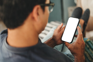 cell phone blank white screen mockup.hand holding texting using mobile on desk at office.background empty space for advertise.work people contact marketing business,technology