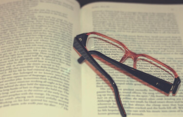 Reading glasses on book