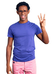 African handsome man wearing casual clothes and glasses showing and pointing up with fingers number three while smiling confident and happy.