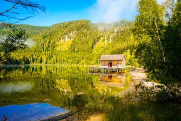 Obraz premium View of the surrounding landscape at Ödensee in Bad Mitterndorf in Styria. Nature at the clear swimming lake in the Salzkammergut in Austria. 